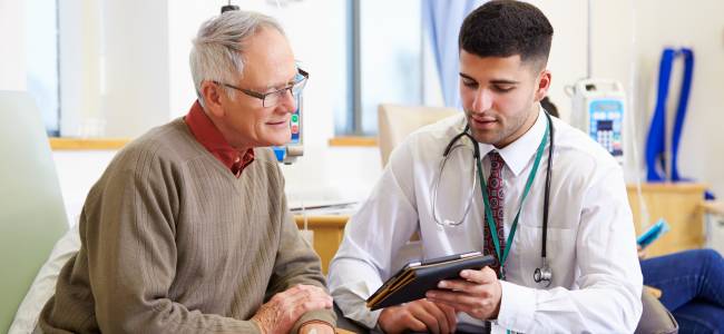 doctor speaking with patient