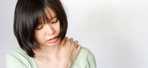 young asian woman back pain